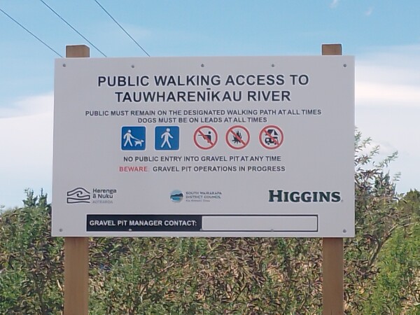 Higgins sign showing public walking access to Tauwharenīkau River