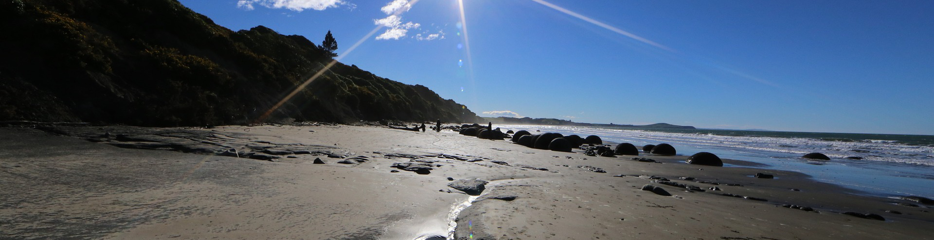 Grey sandy and rocky beach